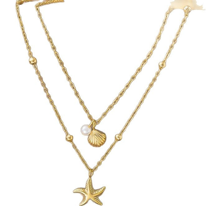 Layered Gold Beach Necklace with Starfish and Seashell Pearl Charms for Women