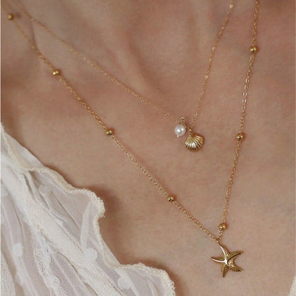 Layered Gold Beach Necklace with Starfish and Seashell Pearl Charms for Women