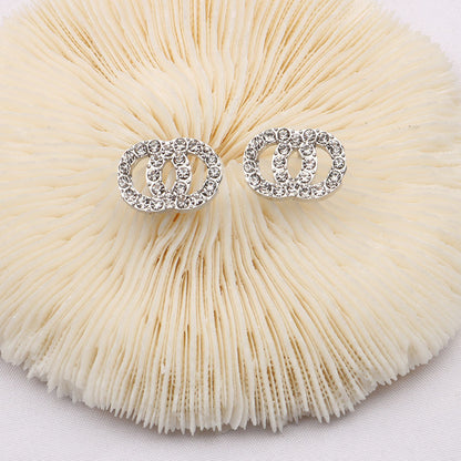 Crystal Interlocking Circle Stud Earrings Gold Plated CZ Studs