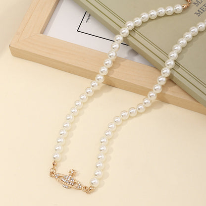 Pearl Choker Necklace with Crown-Shaped Pendant